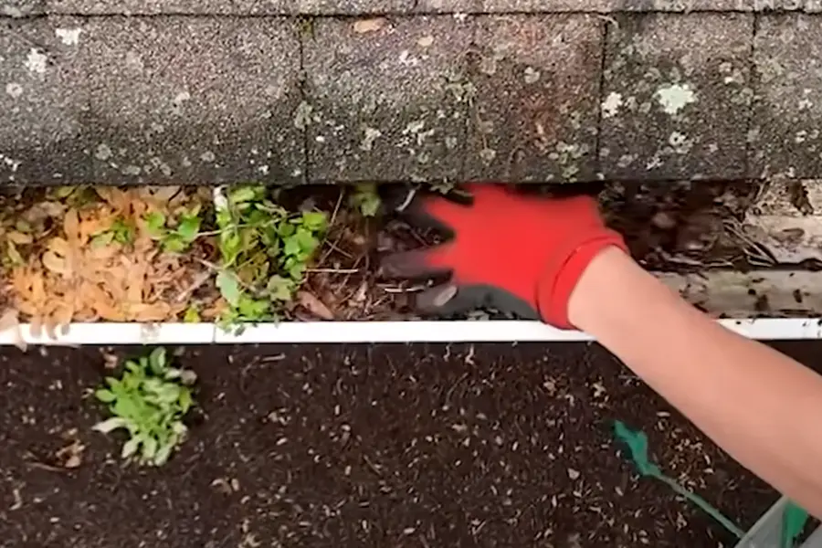 Water rinsing through a recently cleared gutter